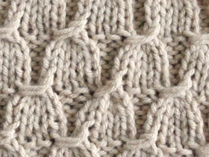 Tassel Stitch Knitting Pattern in Beige color yarn.