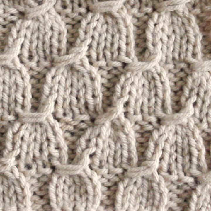 Tassel Stitch Knitting Pattern in Beige color yarn.