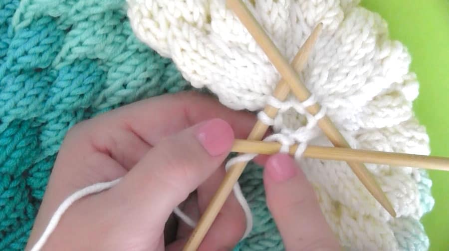 Decreasing Bubble Beanie Hat crown on three double-pointed needles.