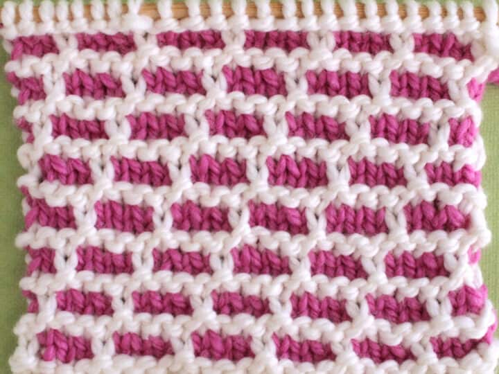 Brick Stitch Knitting Pattern in Pink and White Yarn Colors.