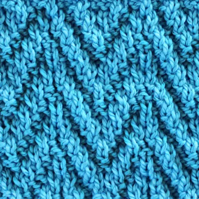 Chevron Knit Stitch pattern in blue color yarn.