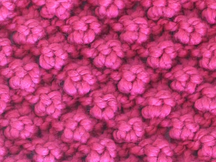 Raspberry Stitch knitted with pink color yarn.