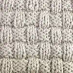 Basket Weave Stitch texture in beige colored yarn.