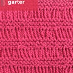 Drop stitch garter knitting pattern in dark pink yarn color by Studio Knit.