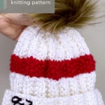 Taylor Swift's 87 Beanie Hat knitted in white and red yarn color by Studio Knit.